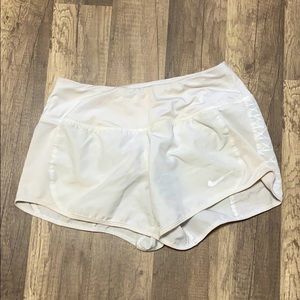 white nike running shorts (xs)